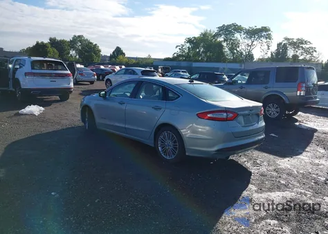2013 Ford Fusion Hybrid Se z USA, uszkodzony, nr VIN 3FA6P0LUXDR187683